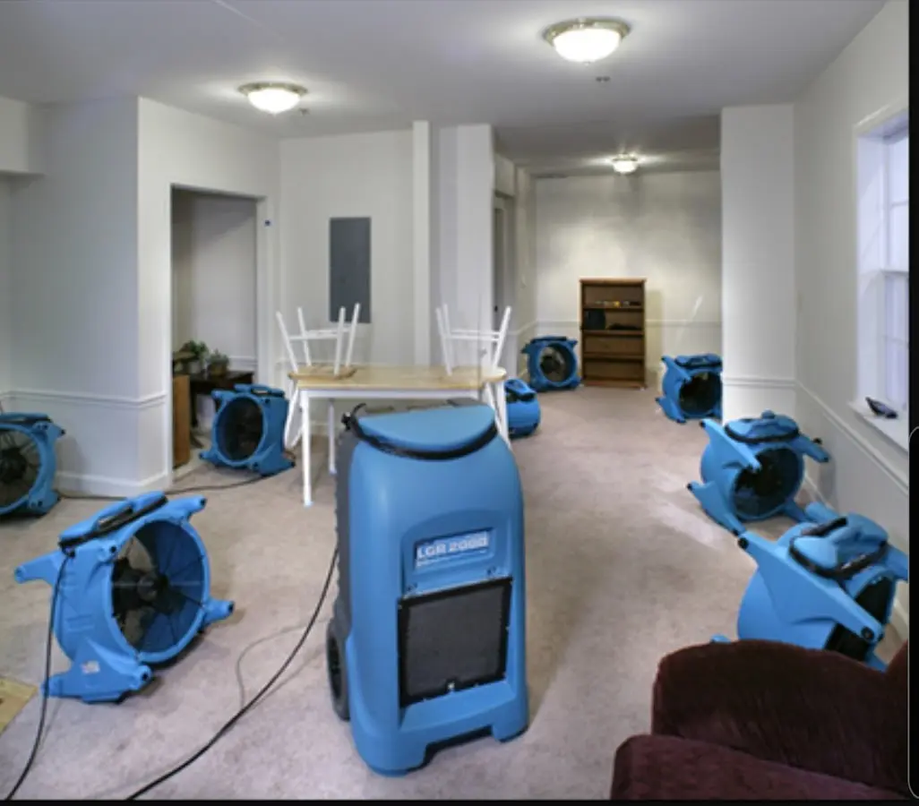 Air movers and dehumidifier setup for Water Extraction & Removal in Socorro